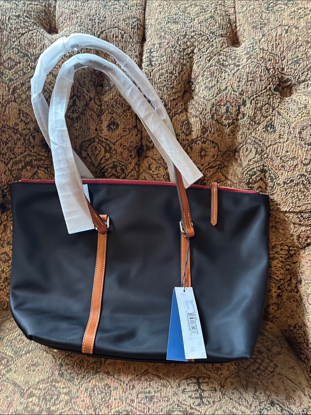 Dooney & Bourke Black Tote with Tan Trim key fob and matching small make up bag. - Picture 2 of 4